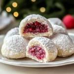 Surprising Raspberry Almond Snowball Cookies